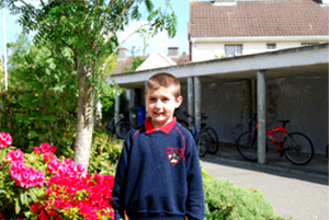 photo of boy in blue tracksuit